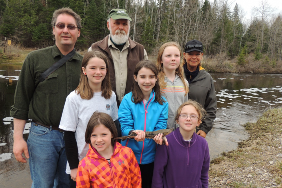 NEMIGLSI sudents and instructors by the waterfront